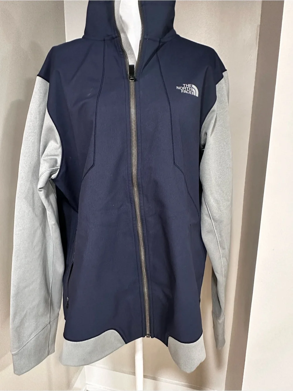 The North Face Navy with Light Gray Sleeve Softshell Jacket. Size L.